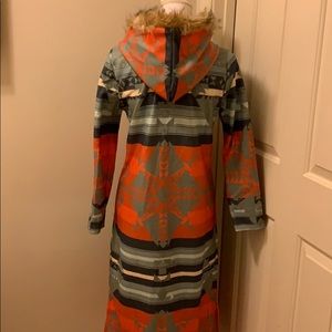 Long hooded jacket with fur trim